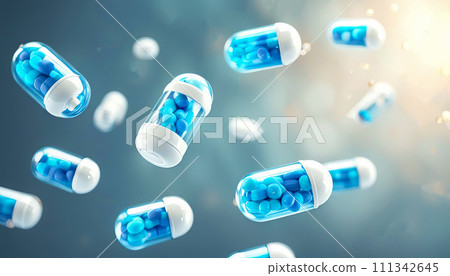 Falling blue and white medicine pill capsules on blue background. Antibiotics Falling blue and white medicine pill capsules on blue background. Antibiotics 111342645