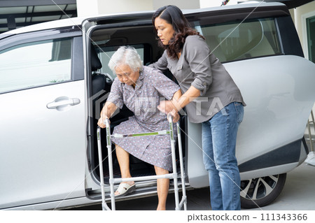 Asian senior woman patient walk with walker prepare get to her car, healthy strong medical concept. 111343366