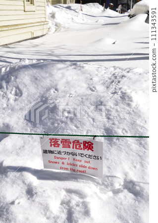 Snow falling attention 111343591