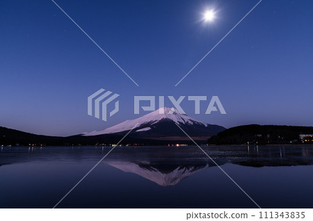 Upside down Fuji and the moon seen from Lake Yamanaka at dawn in Yamanashi Prefecture Upside down Fuji and the moon seen from Lake Yamanaka at dawn in Yamanashi Prefecture 111343835