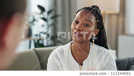 Psychology, mental health and empathy with a black woman therapist talking to a patient in her office. Support, consulting and trauma with a young psychologist listening to a client in grief therapy Psychology, mental health and empathy with a black woman therapist talking to a patient in her office. Support, consulting and trauma with a young psychologist listening to a client in grief therapy 111344001