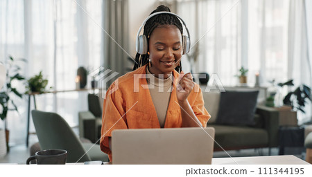 Laptop, dancing and young woman in the living room listening to music, album or radio of apartment. Technology, smile and young African female person streaming a song on a computer in lounge at home. Laptop, dancing and young woman in the living room listening to music, album or radio of apartment. Technology, smile and young African female person streaming a song on a computer in lounge at home. 111344195