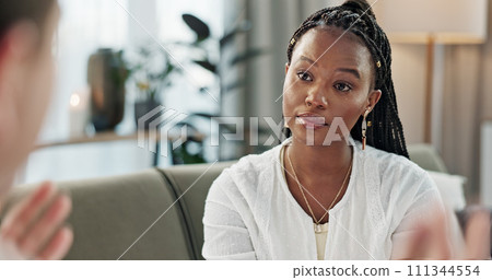 Psychology, mental health and empathy with a black woman therapist talking to a patient in her office. Support, consulting and trauma with a young psychologist listening to a client in grief therapy 111344554
