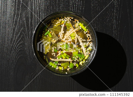 Fish Broth with Greens, Sesame Seeds and Herbs Fish Broth with Greens, Sesame Seeds and Herbs 111345392