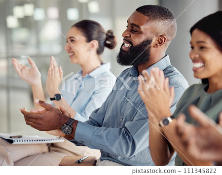 Applause, motivation and success with a business team clapping during a workshop for learning, coaching and development. Collaboration, teamwork and goal with a crowd in celebration of an achievement Applause, motivation and success with a business team clapping during a workshop for learning, coaching and development. Collaboration, teamwork and goal with a crowd in celebration of an achievement 111345822