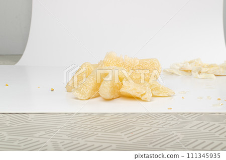 Pomelo Fruit Pieces Isolated on White, Big Yellow Grapefruit Pulp, Healthy Diet Pummelo Pomelo Fruit Pieces Isolated on White, Big Yellow Grapefruit Pulp, Healthy Diet Pummelo 111345935