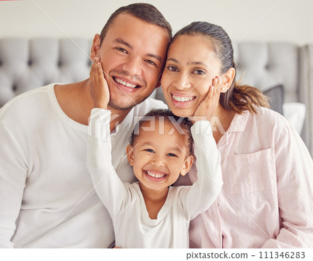 Happy family, morning bonding and love from child with mother and father in their bedroom after waking up and wearing pajamas. Portrait of man, woman and daughter showing smile and close bond at home Happy family, morning bonding and love from child with mother and father in their bedroom after waking up and wearing pajamas. Portrait of man, woman and daughter showing smile and close bond at home 111346283