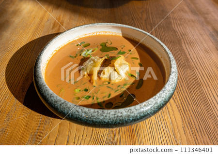 Nepalese Momo Jhol Achar Dumpling Soup, Fried Gyoza Broth, Spicy Tomato Momo Seasoned Soup Nepalese Momo Jhol Achar Dumpling Soup, Fried Gyoza Broth, Spicy Tomato Momo Seasoned Soup 111346401