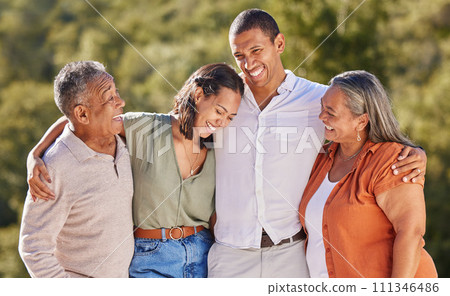 Happy, hug and smile, an adult family in a park standing together. Mother, father grown up kids laughing. Happiness, love and nature, man and woman with senior couple in nature at an outdoor event. 111346486