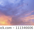 Vanilla twilight cloudy sky after the heavy raining. With the flying airplane. 111346606