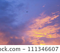 Vanilla twilight cloudy sky after the heavy raining. With the flying airplane. 111346607