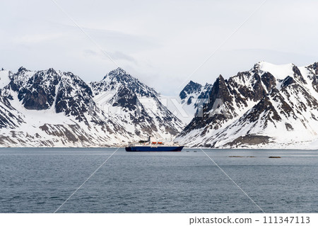 Expedition ship in Arctic sea, Svalbard. Passenger cruise vessel. Arctic and Antarctic cruise. Expedition ship in Arctic sea, Svalbard. Passenger cruise vessel. Arctic and Antarctic cruise. 111347113