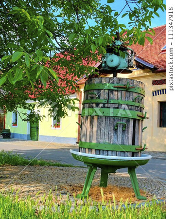 Old wine press. Wine background in Czech Republic, South Moravia Old wine press. Wine background in Czech Republic, South Moravia 111347918