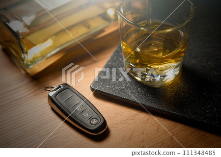 Drink and drive, alcoholism with car keys 111348485