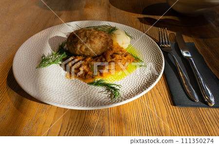 Breaded Meat Cutlets with Mashed Potatoes and Stewed Cabbage Garnish, Restaurant Main Course 111350274