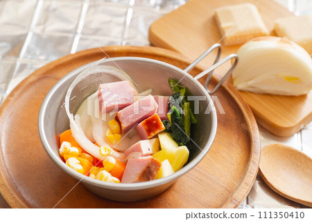 Stew ingredients in a shella cup Stew ingredients in a shella cup 111350410