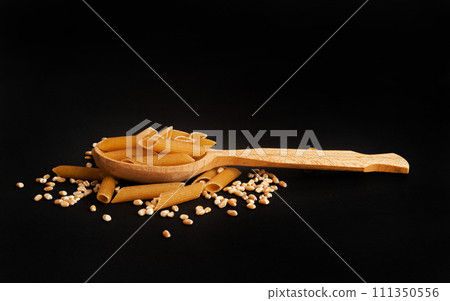 Raw Brown Pasta, Wholegrain Penne, Dry Whole Grain Noodle, Raw Spelt Macaroni, Healthy Italy Food 111350556