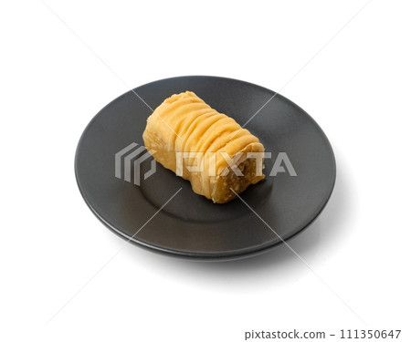 Rolled Baklava Isolated, Ramadan Dessert Roll on Restaurant Plate, Eastern Sweet Pastries 111350647