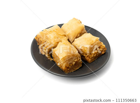 Baklava Isolated, Small Ramadan Dessert, Eastern Sweet Filo Pastries, Turkish Honey Baklawa, Oriental Desert Baklava Isolated, Small Ramadan Dessert, Eastern Sweet Filo Pastries, Turkish Honey Baklawa, Oriental Desert 111350663