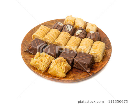 Baklava Isolated, Small Ramadan Dessert, Eastern Sweet Filo Pastries, Turkish Honey Baklawa, Oriental Desert Baklava Isolated, Small Ramadan Dessert, Eastern Sweet Filo Pastries, Turkish Honey Baklawa, Oriental Desert 111350675