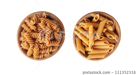 Raw Brown Pasta, Wholegrain Fusilli, Dry Whole Grain Noodle, Raw Spelt Macaroni, Healthy Italy Food Raw Brown Pasta, Wholegrain Fusilli, Dry Whole Grain Noodle, Raw Spelt Macaroni, Healthy Italy Food 111352318