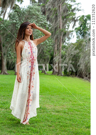 Beautiful Asian Young Woman Girl In a White Dress 111352620