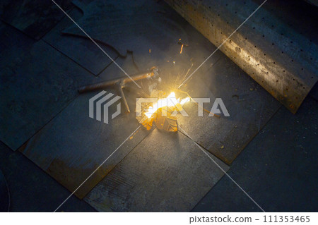 Laser cleaning of metal. The laser beam cleans the metal surface from rust. Laser removes removing old rust from metal. Innovation metalworking. New technologies Laser cleaning of metal. The laser beam cleans the metal surface from rust. Laser removes removing old rust from metal. Innovation metalworking. New technologies 111353465