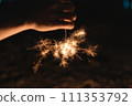 people who play sparklers 111353792