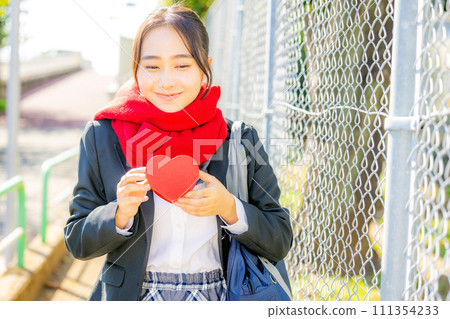 Woman with heart 111354233