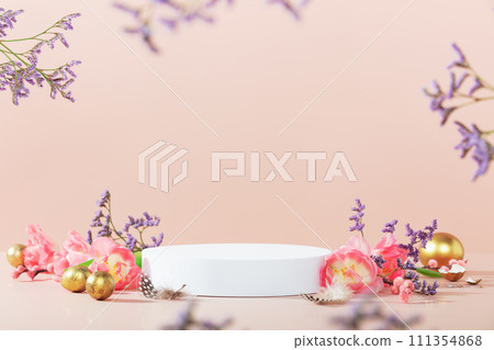 Empty round podium, easter gold eggs with spring tulip flowers on a pink background 111354868