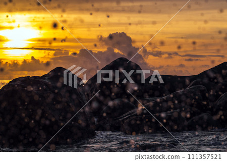 Beach landscape with splashes of shorewater 111357521