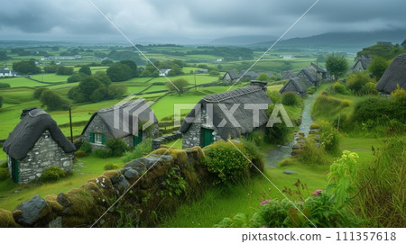 Panoramic view of an ancient Celtic village, traditional stone houses, lush green landscape 111357618