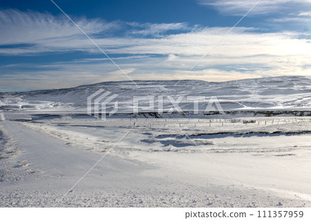 Country with a fresh snow and blue sky, Iceland Country with a fresh snow and blue sky, Iceland 111357959