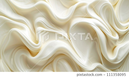 Creamy waves of milk curl and intertwine, forming mesmerizing shapes 111358095