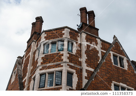 Low angle view of old luxury residential building in London Low angle view of old luxury residential building in London 111358373