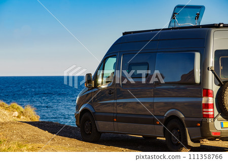 Caravan van camping on coast sea shore Caravan van camping on coast sea shore 111358766