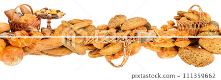 Panorama of fresh bread products isolated on white 111359662