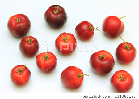 macro, closeup of fresh organic Acerola group, isolated on white background with clipping path 111360153