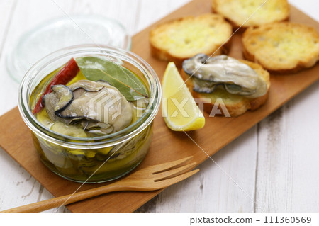 Homemade oysters marinated in olive oil Homemade oysters marinated in olive oil 111360569