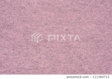 Pink knitted fabric, draped jersey cloth background. Knitted background of knitwear. 111360712