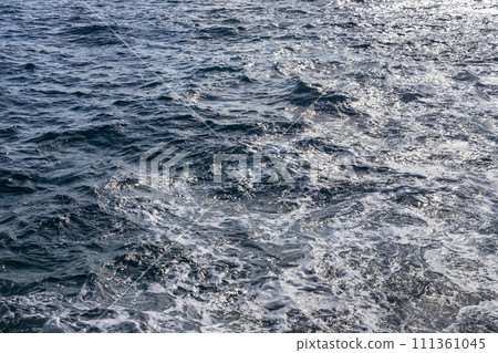 Blue water surface with small waves at sea Blue water surface with small waves at sea 111361045