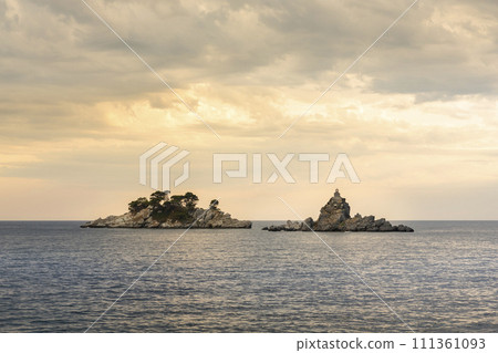 Island of Sveta Nedelja (Saint Sunday) at sunset near Petrovac in Montenegro 111361093
