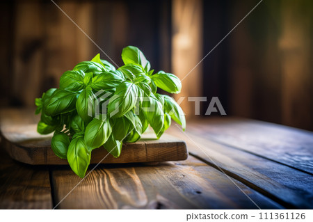 Green fresh basil on the wooden table. Green fresh basil on the wooden table. 111361126