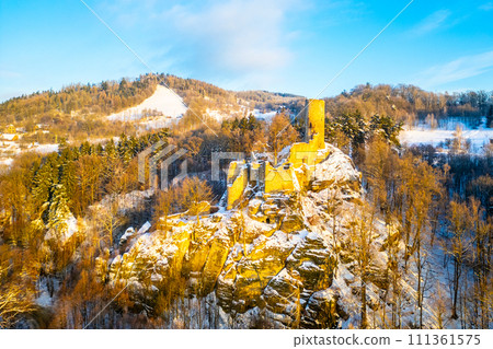 Frydstejn medieval castle ruins at cold morning sunrise time. Bohemian Paradise, Czech: Cesky raj, Czechia. Aerial view from above. Frydstejn medieval castle ruins at cold morning sunrise time. Bohemian Paradise, Czech: Cesky raj, Czechia. Aerial view from above. 111361575
