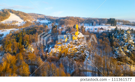 Frydstejn medieval castle ruins at cold morning sunrise time. Bohemian Paradise, Czech: Cesky raj, Czechia. Aerial view from above. Frydstejn medieval castle ruins at cold morning sunrise time. Bohemian Paradise, Czech: Cesky raj, Czechia. Aerial view from above. 111361577