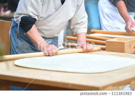 Hand-made soba noodles by a soba chef at the festival Hand-made soba noodles by a soba chef at the festival 111361983