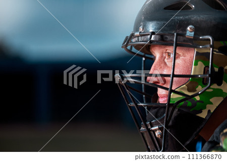 Sports athlete with face helmet, fitness professional gear and man training for winter game. Competition equipment closeup, power player with action wire mask on dark background and strong protection 111366870