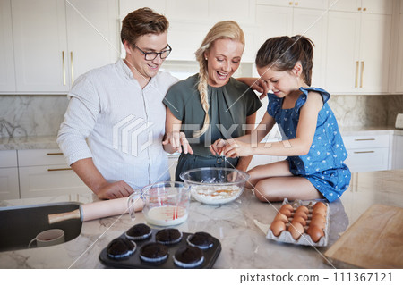 Mother, father and girl baking as a happy family in the kitchen enjoying quality time and the weekend together. Smile, happiness and mom helping young child with dad and ready to bake with egg 111367121