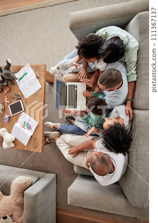 Family, children and video call with kids, parents and grandparents using a laptop on the sofa at home. Communication, wave and internet with a girl, boy and relatives in a living room from above 111367137