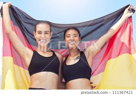 Women, sports team and German winner flag in exercise, workout or training competition success. Portrait, happy smile or fitness people with country pride, motivation goals or wellness target mindset Women, sports team and German winner flag in exercise, workout or training competition success. Portrait, happy smile or fitness people with country pride, motivation goals or wellness target mindset 111367421